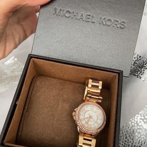 Michael Kors watch with rhinestones around the face
